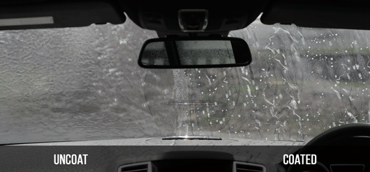 Side-by-side comparison of an uncoated windshield fogged with rain versus a ceramic-coated windshield with water beading off clearly