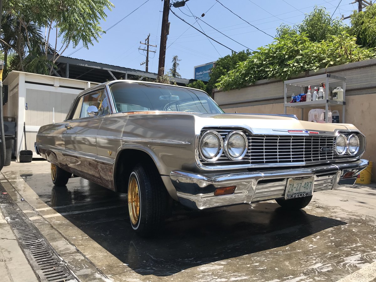 Champagne 1964 Chevrolet Impala detailed at Fair Oaks Car Wash in Altadena