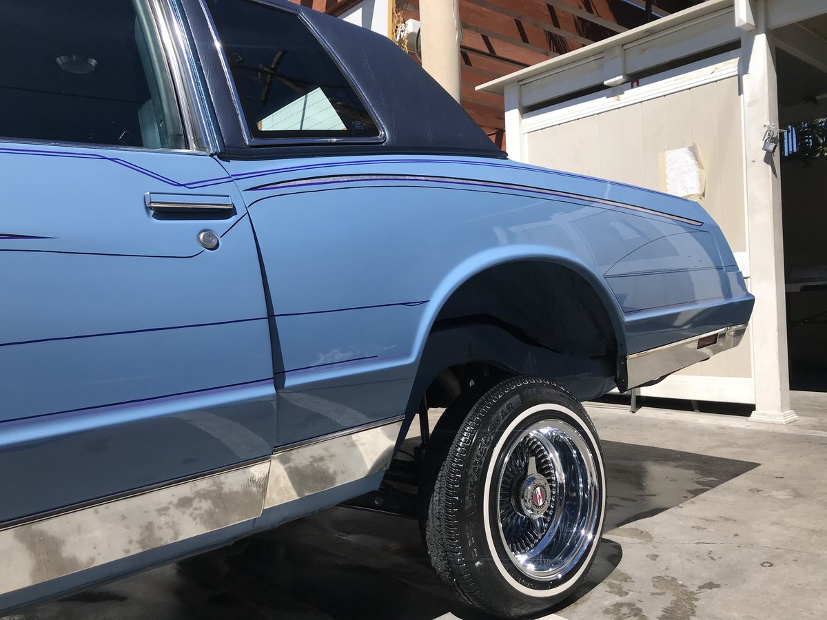 Light blue classic lowrider detailed at Fair Oaks Car Wash in Altadena